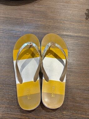MICHAEL Michael Kors Gold and Yellow Striped Jelly Flip Flops